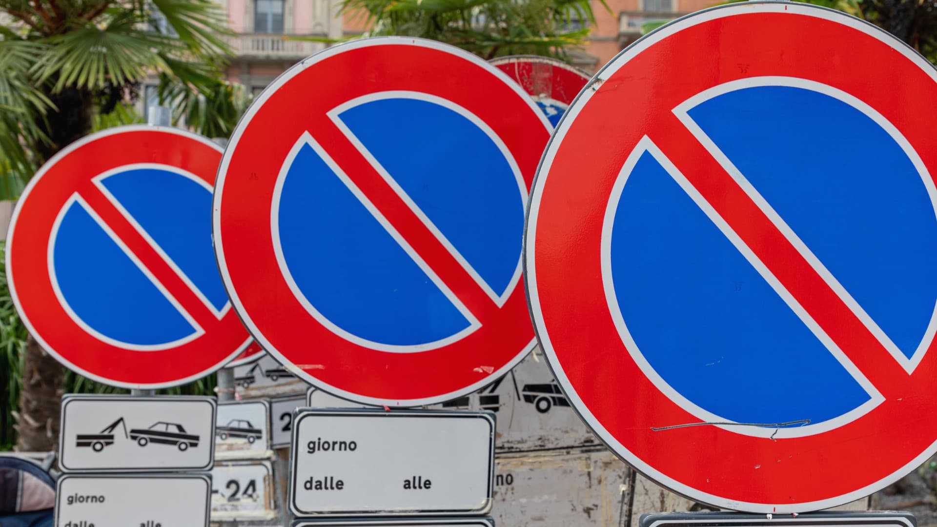 Many Temporary No Parking Traffic Signs at Street
